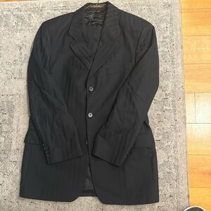 This is a 2 piece men suit. The suit is a 38R/32R.